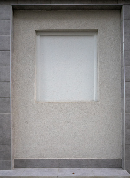 rehabilitación de fachada en donostia, gipuzkoa: acabado del bajo en fachada lateral